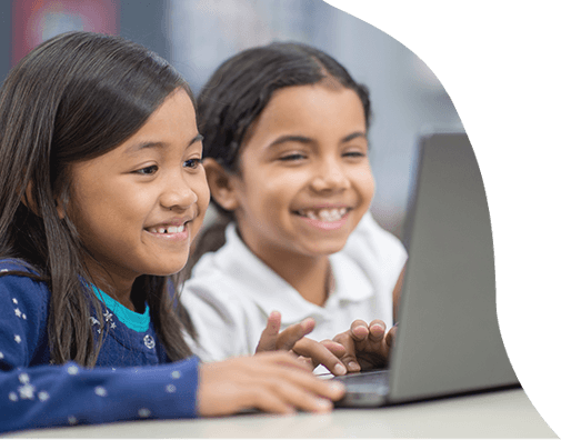 Mom and daughter looking a laptop smiling and surprised